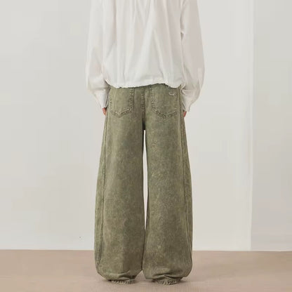 Green distressed denim